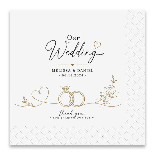 Personalized cocktail napkins with custom wedding design, featuring elegant bride and groom artwork on premium white folded napkins